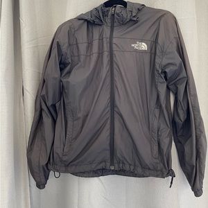 North Face windbreaker. Colour is a dark blue almost black.